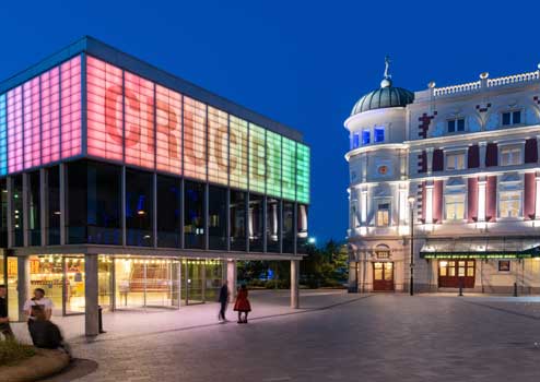 2 buildings, one with CRUCIBLE on LED boards