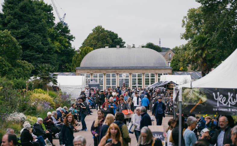 Crowds of people at an event at Sheffield Botanical Gardens