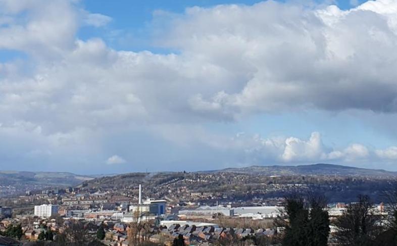 Sheffield's skyline - view of the city with cloudy blue skies