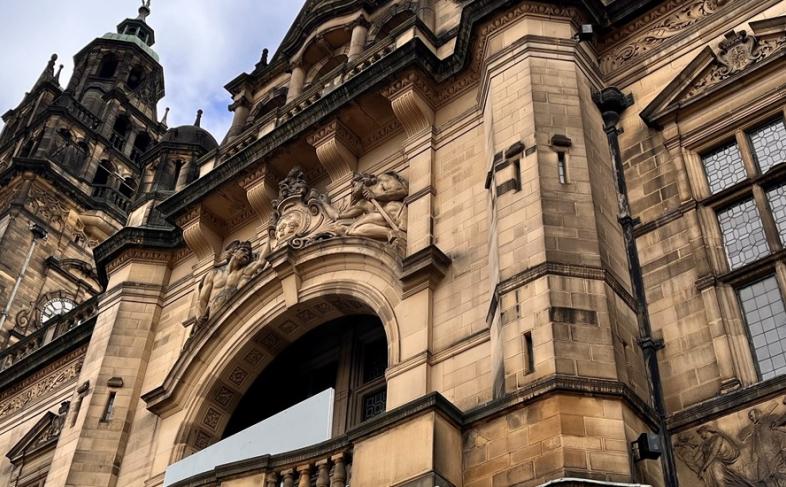 image of the Town Hall balcony and the leaded windows at the front of the Town Hall
