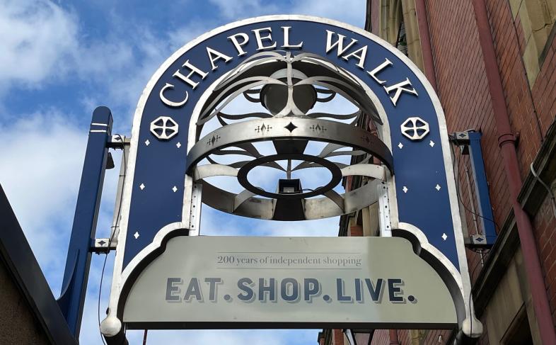 The Chapel Walk sign which hangs above the entrance to the lane.