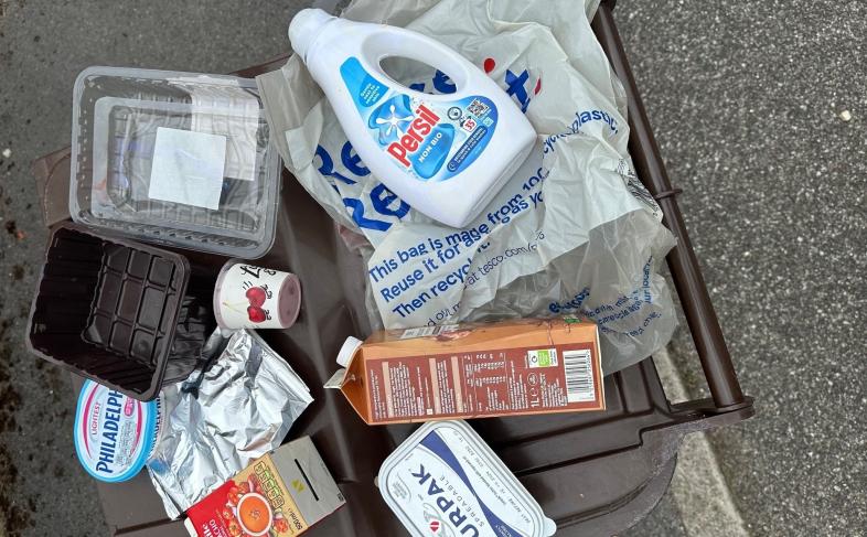 empty cartons, tubs and plastics in a pile
