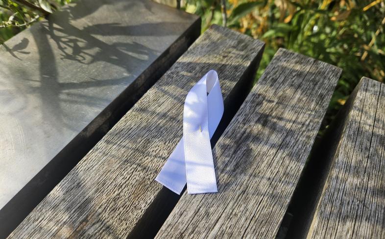 White ribbon on bench