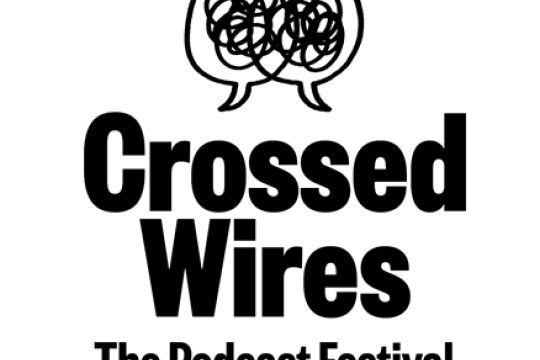 Two speech bubbles overlapping with text underneath that reads Crossed Wires The Podcast Festival