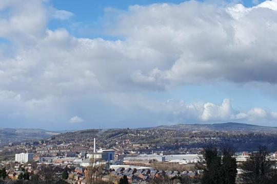 Sheffield's skyline - view of the city with cloudy blue skies