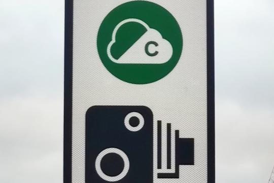 A road sign displaying the Clean Air Zone