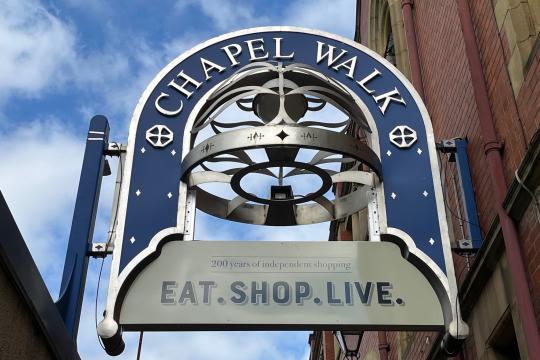 The Chapel Walk sign which hangs above the entrance to the lane.