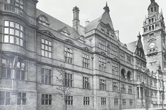 A black and white picture showing the Surrey Street side of Sheffield Town Hall with the picture taken shortly after the building opened in 1897.