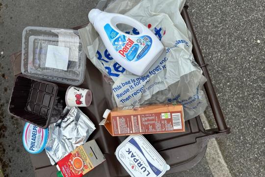 empty cartons, tubs and plastics in a pile