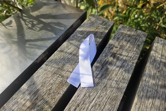 White ribbon on bench
